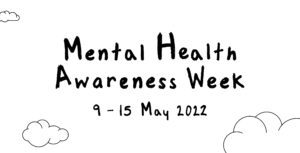 Hand written text which reads Mental Health Awareness Week 9-15 May 2022