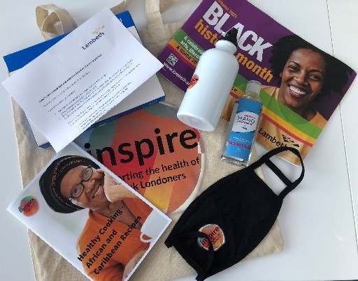 Photo pof leaflets and merchandise from Aspire, the Black Communities Health Event