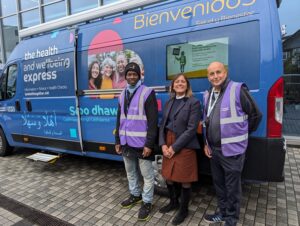 Cllr Rezina Chowdhury alongside Mem and Aderito, Health Champions, at the Health and Wellbeing Bus